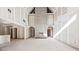Large living room with a two story ceiling and fireplace at 1730 Etchison Spur, Loganville, GA 30052