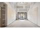 Large living room with high ceilings and french doors at 1730 Etchison Spur, Loganville, GA 30052