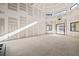Open living room with high ceilings and many windows at 1730 Etchison Spur, Loganville, GA 30052