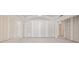 Large living area with tray ceilings and lots of natural light at 1730 Etchison Spur, Loganville, GA 30052