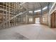 Large living room framed and ready for finishing touches at 1730 Etchison Spur, Loganville, GA 30052
