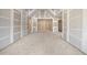 Spacious living room with high ceilings and a fireplace at 1730 Etchison Spur, Loganville, GA 30052