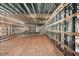 Long unfished hallway with metal and wood framing, ready for interior build-out at 1730 Etchison Spur, Loganville, GA 30052