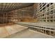 Upper level unfinished room with sloped ceilings and abundant natural light at 1730 Etchison Spur, Loganville, GA 30052