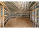Unfished room with sloped ceilings and metal framing, ready for your design at 1730 Etchison Spur, Loganville, GA 30052
