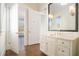 Elegant bathroom with marble vanity and large mirror at 3862 Stratford Park Ne Dr, Atlanta, GA 30342