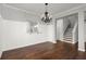 Elegant dining room featuring hardwood floors and a chandelier at 4618 Liberty Square Dr, Acworth, GA 30101