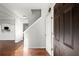 Bright entryway with hardwood floors and staircase at 4618 Liberty Square Dr, Acworth, GA 30101