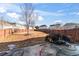 Large fenced backyard with patio and mature trees at 6469 Alder Ln, Norcross, GA 30093