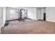 Spacious home gym with various weight training equipment at 2925 Bluestone Sw Dr, Atlanta, GA 30331