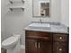 Modern basement bathroom with dark vanity and floating sink at 517 Lady Fern Pt, Alpharetta, GA 30022