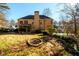 Two-story house with a large deck and screened porch at 601 Goldpoint Trce, Woodstock, GA 30189