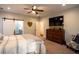 Serene bedroom with carpeted floors and ceiling fan at 1024 Riverstone Dr, Social Circle, GA 30025