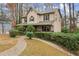 Two-story house with a curved brick pathway leading to the front porch at 2183 Shillings Chase Nw Dr, Kennesaw, GA 30152