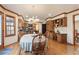 Eat-in kitchen features hardwood floors and a round dining table at 4327 Lake Chimney Ne Ct, Roswell, GA 30075