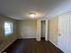 Spacious bedroom with ample closet space and dark laminate flooring at 4195 Blanton Sw Ave, Atlanta, GA 30331