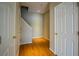 Hardwood floor hallway with white doors and neutral walls at 308 Spring Heights Lane # 308, Smyrna, GA 30080