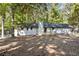 House exterior with white brick, deck and backyard at 4336 Parkview Drive, Lithia Springs, GA 30122