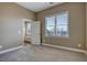 Comfortable bedroom with a view and built-in shelving at 3166 Sable Ridge Dr, Buford, GA 30519