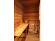 This sauna boasts wood walls, a bench, and a wood-burning stove at 3166 Sable Ridge Dr, Buford, GA 30519