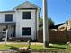 White two-story house with modern wood fence at 429 Grant Se St, Atlanta, GA 30312