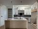 Bright kitchen with white cabinets, quartz countertops and herringbone backsplash at 429 Grant Se St, Atlanta, GA 30312