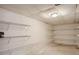 Unfinished basement with wire shelving for storage at , Acworth, GA 30101