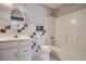Clean bathroom with white vanity and floral tile at , Acworth, GA 30101