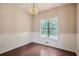 Well-lit dining room with hardwood floors and backyard view at , Acworth, GA 30101
