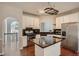 Modern kitchen with white cabinets, granite island, and stainless steel appliances at , Acworth, GA 30101