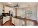 Updated kitchen with white cabinets, granite countertops, and an island at , Acworth, GA 30101