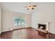 Bright living room with hardwood floors, a fireplace, and large windows at , Acworth, GA 30101
