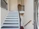 Elegant staircase with white risers and black treads at , Acworth, GA 30101