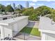 Private rooftop deck with artificial turf and city views at 359 Brownstones Ne Cir, Atlanta, GA 30312