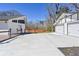 Spacious concrete driveway leading to house and garage at 310 Ferndale Sw Dr, Mableton, GA 30126