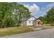 Modern farmhouse exterior with a deck at 1183 Highway 138, Jonesboro, GA 30236