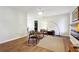 Living room with hardwood floors, fireplace, and mid century seating at 8 Regency Se Way, Mableton, GA 30126