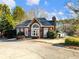 Brick clubhouse with welcoming entrance at 1877 Kennard Court, Snellville, GA 30078