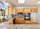 Modern kitchen with double oven and granite countertops at 1877 Kennard Court, Snellville, GA 30078