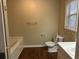 Bathroom with tub, toilet, and vanity at 2725 Dacula Cove Cir, Dacula, GA 30019