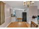 Bright dining room with wood table and view into kitchen at 1093 Kipling Se St, Atlanta, GA 30315