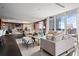 Spacious common area with comfortable seating and city views at 3630 Peachtree Ne Rd # 2207, Atlanta, GA 30326