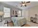 Bright bedroom with carpet flooring and ceiling fan at 3006 Cambridge Hill Dr, Dacula, GA 30019