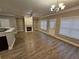 Bright living area with hardwood floors, fireplace and neutral walls at 2221 Sw Oxford Sw Ct, Atlanta, GA 30331