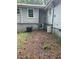 Unfinished basement with HVAC unit and exterior access at 1198 Johnson Brady Rd, Canton, GA 30115