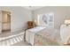 Bedroom with ensuite bathroom and a floral quilt at 230 Edwards Brook Ct, Canton, GA 30115