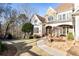 House with stone accents and landscaping at 230 Edwards Brook Ct, Canton, GA 30115