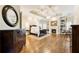 Spacious main bedroom with hardwood floors, fireplace, and built-in shelving at 230 Edwards Brook Ct, Canton, GA 30115