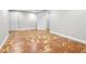 Finished basement room with stained concrete floors and access to other rooms at 86 Templeton Ln, Villa Rica, GA 30180