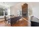 Bright dining area with stone fireplace and hardwood floors at 4159 Gemstone Ter, Marietta, GA 30062